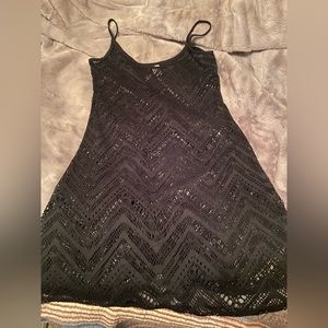 Bongo swimsuit coverup. Size Small. Black Mesh-Like material.